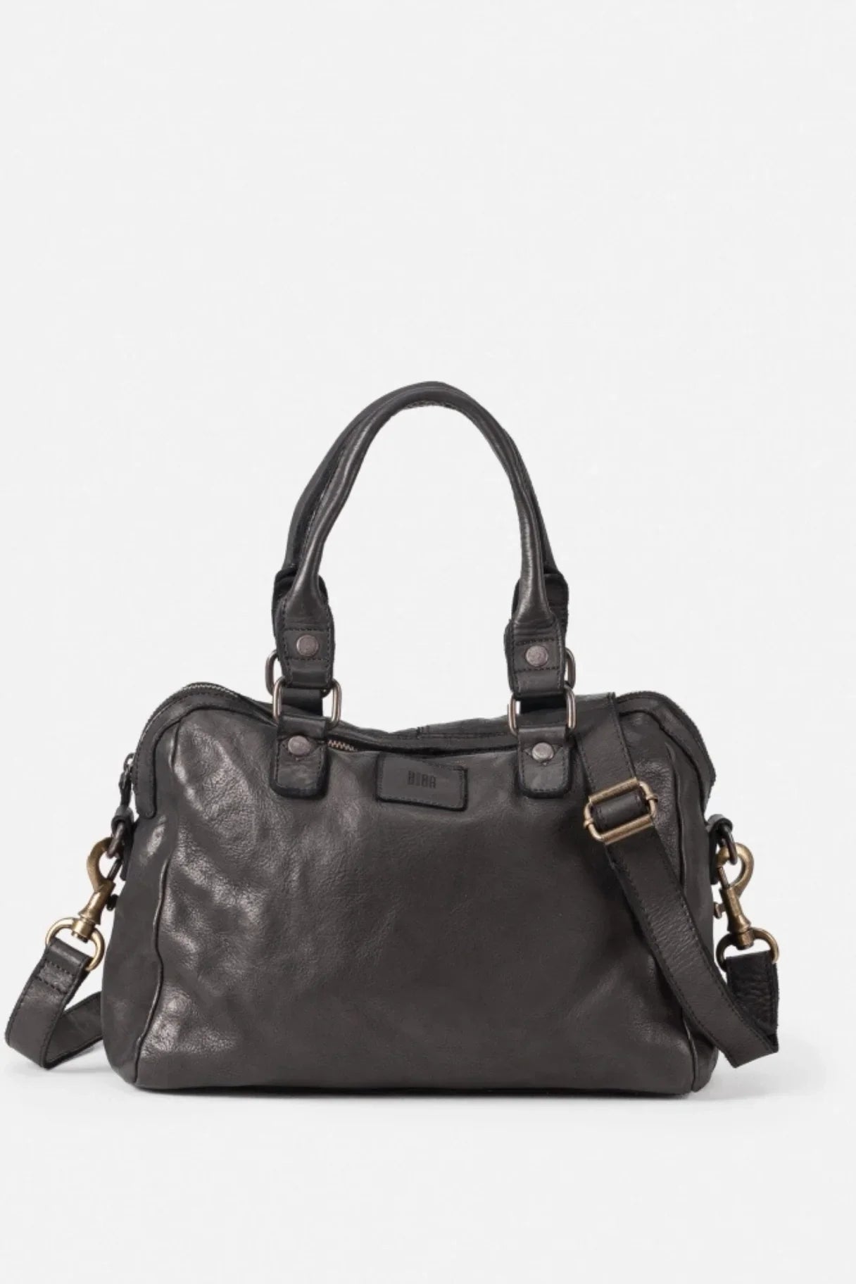 Sac bowling en cuir porté main, cuir tanné végétal